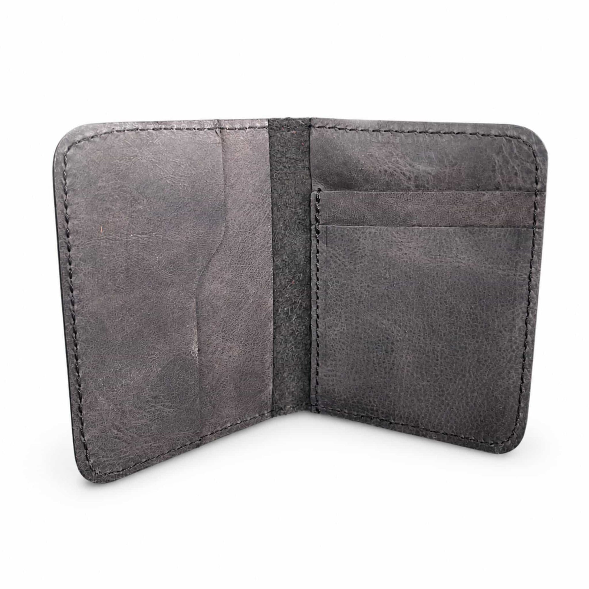 Dark brown genuine leather bifold card wallet open showing card slots — Hoxne Leather