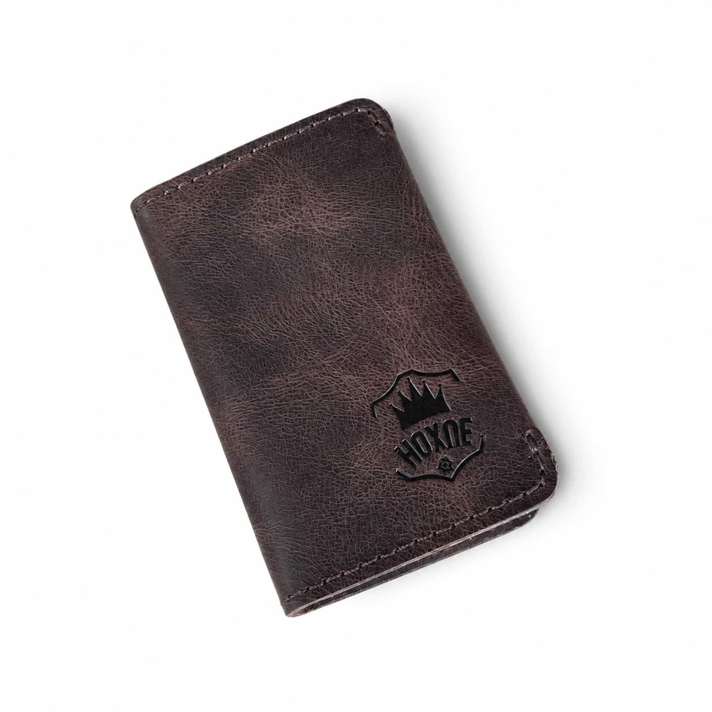 Hoxne Leather minimalist card holder in brown, front view