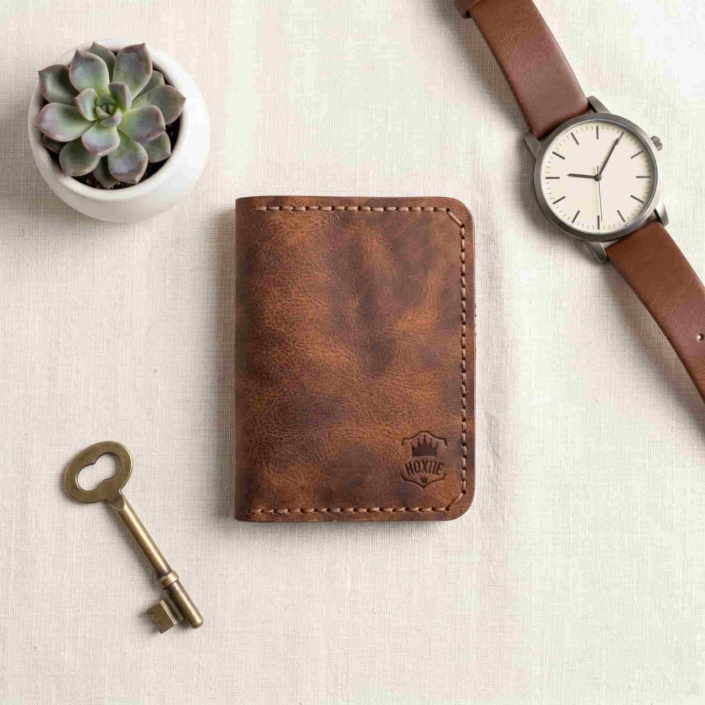 Hoxne Leather passport holder flat lay, premium leather travel