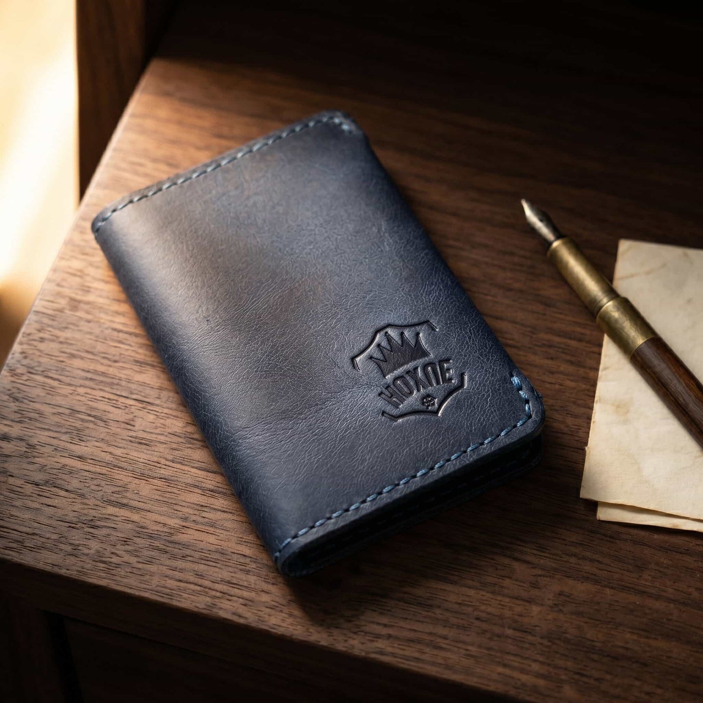 Hoxne Leather minimalist card holder on desk, genuine leather