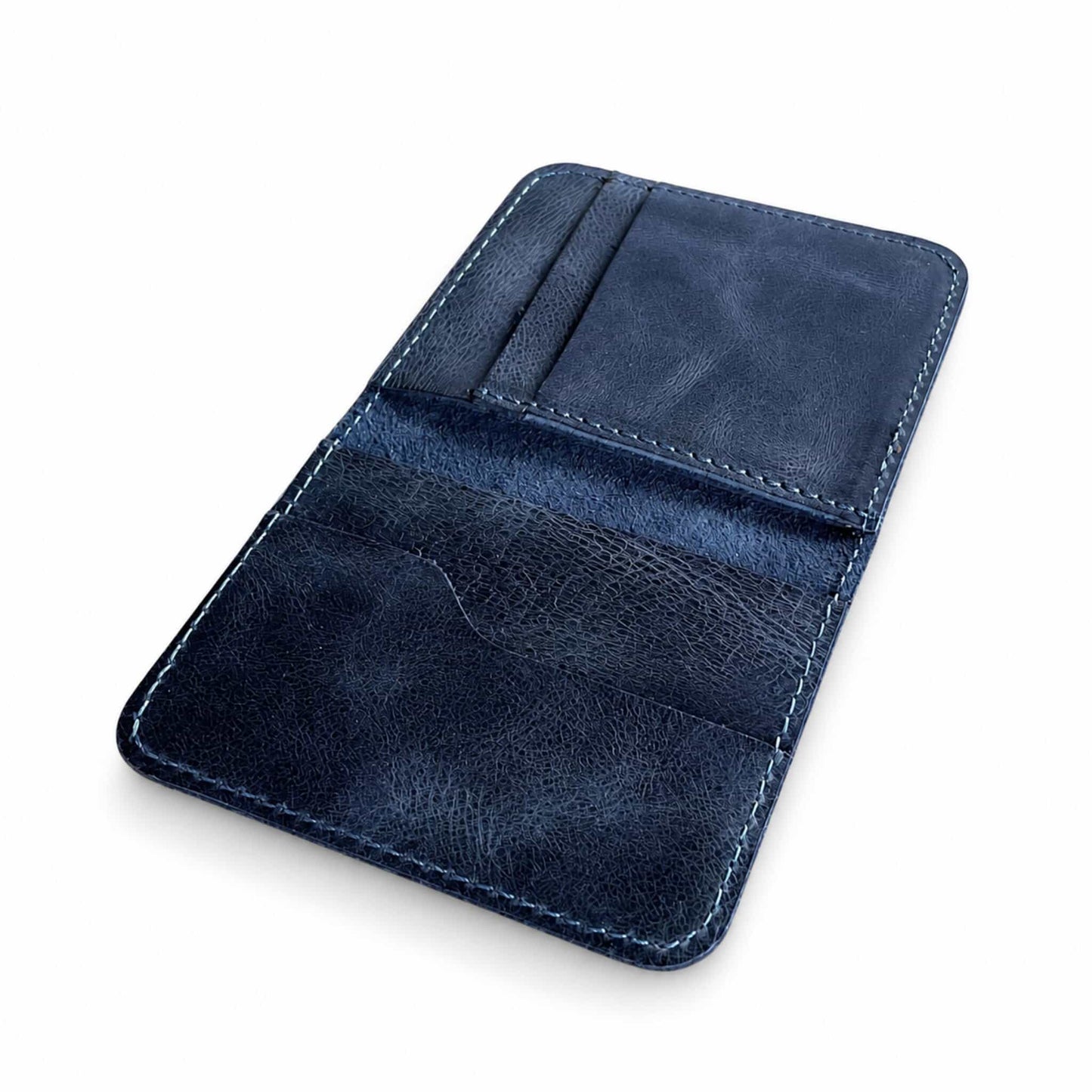 Navy blue full-grain leather bifold card wallet in navy blue open view — Hoxne Leather